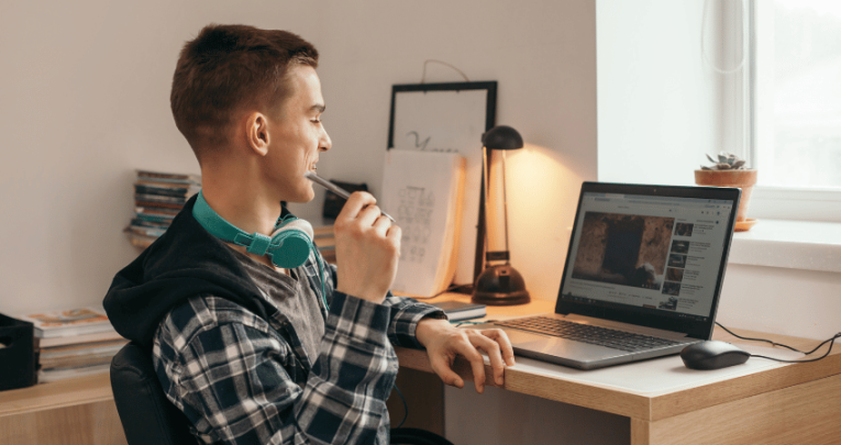 Student at home watching video, to represent flipped learning