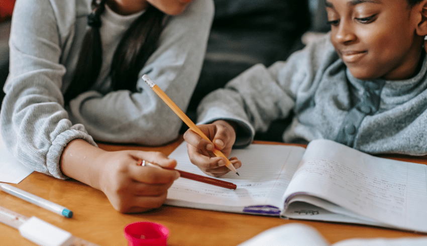 Child completing homework, representing the idea of a homework policy