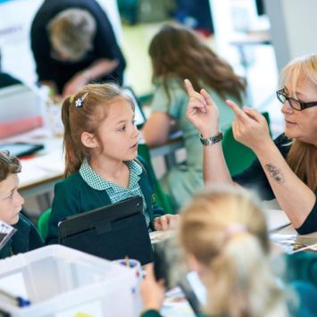 Children in classroom doing guided reading