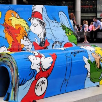 Bench covered in Dr Seuss books illustrations