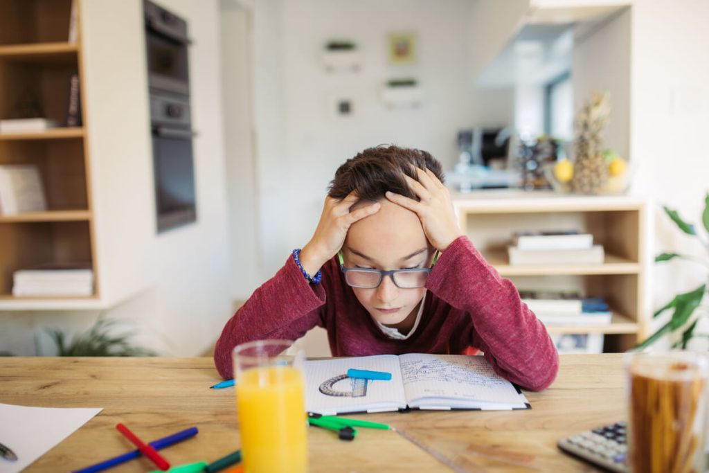 Stressed boy preparing for Year 4 times tables test