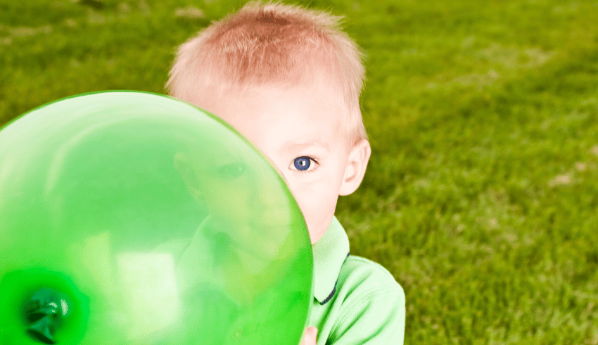 Boy holding balloon, representing Early Years activities