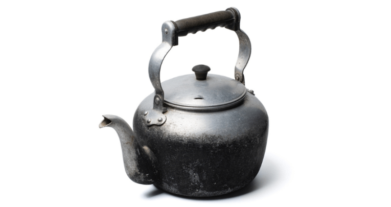 An old tin kettle, representing historical objects