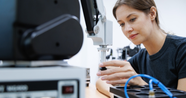 A female student in an engineering classroom