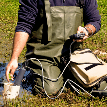 Man undertaking testing in a wet field, representing Green Careers Week