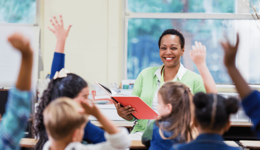 Teacher at front of class, representing the idea of quiet children