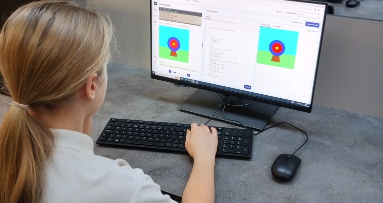 A schoolgirl working at a computer