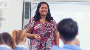 Teacher at front of class, representing scaffolding in education