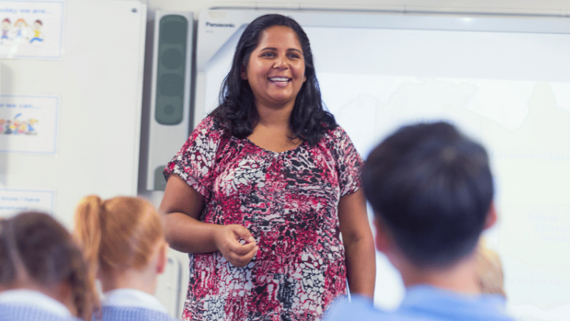 Teacher at front of class, representing scaffolding in education