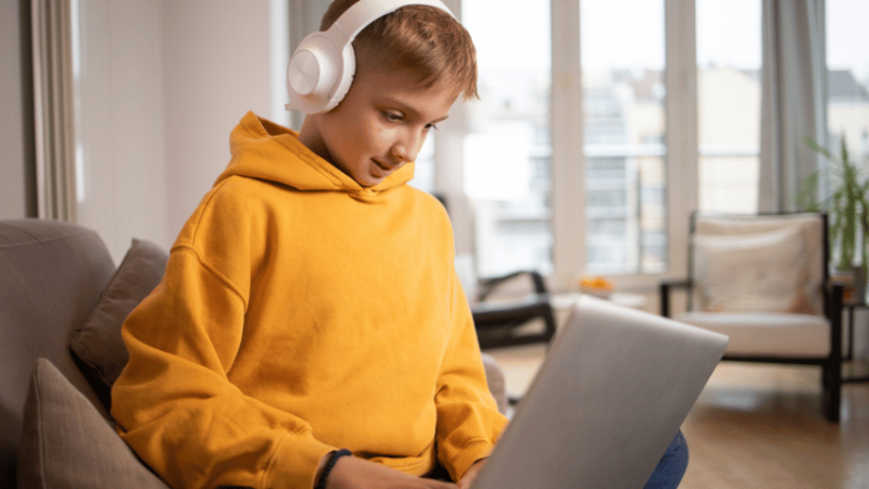 Boy on laptop, representing alternative provision