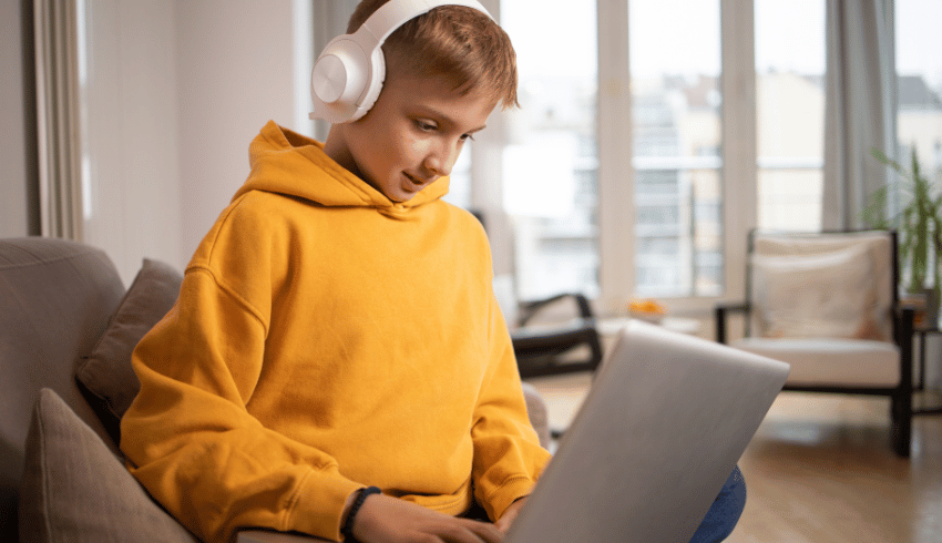 Boy on laptop, representing alternative provision