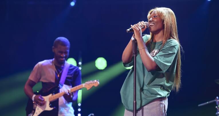 A secondary school girl singing at the Royal Albert Hall