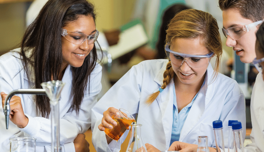 Teenagers doing science practical